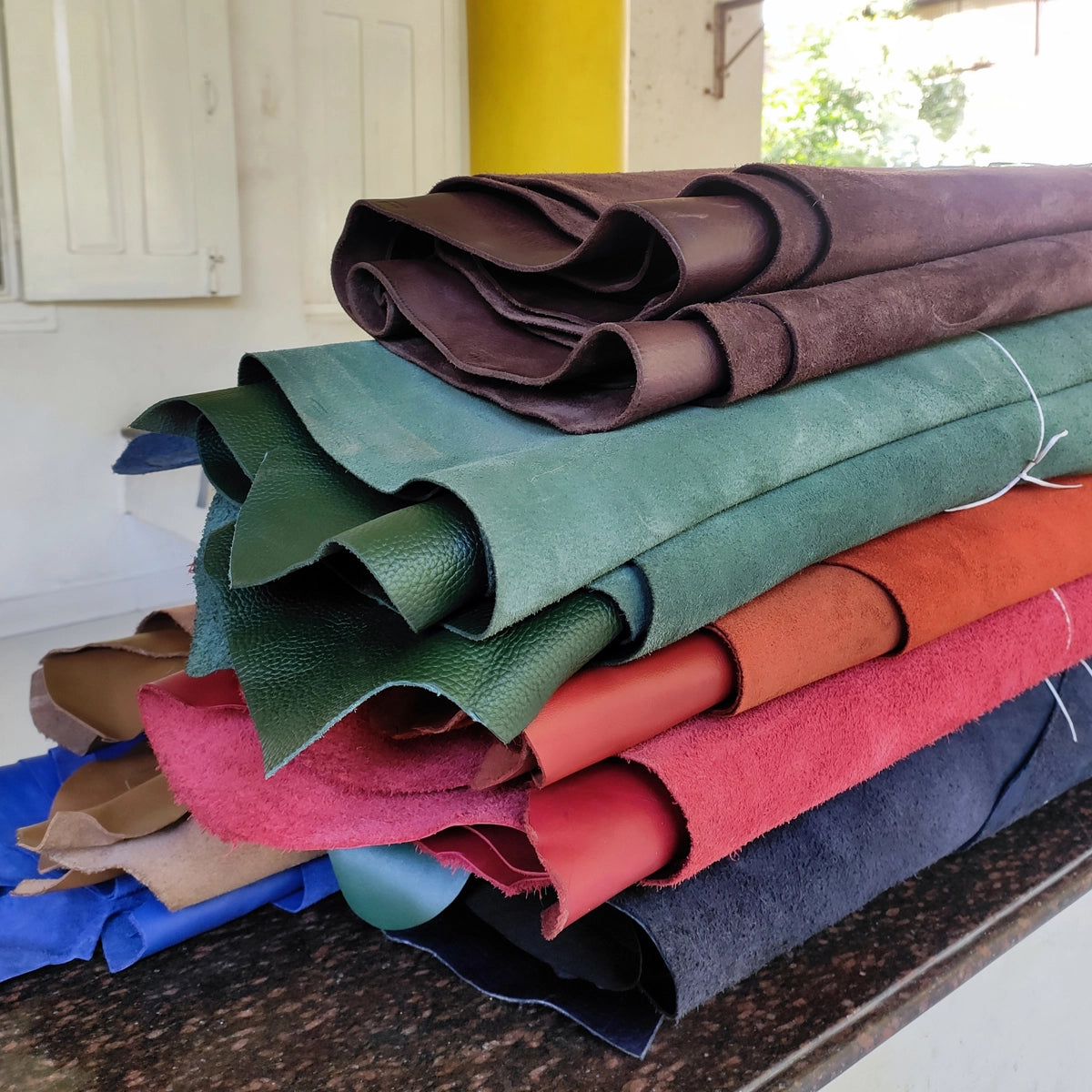 WILDSOUL upcycled leather craftsmanship in the workshop